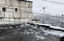 Очистка крыши дома по адресу ул. Клары Цеткин, 27 от снега